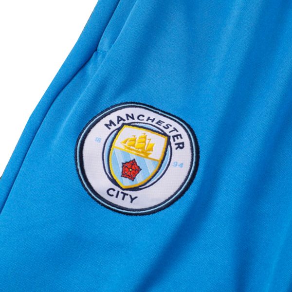 Manchester City 1/4 Zip Tracksuit 2023/24 Kids Blue